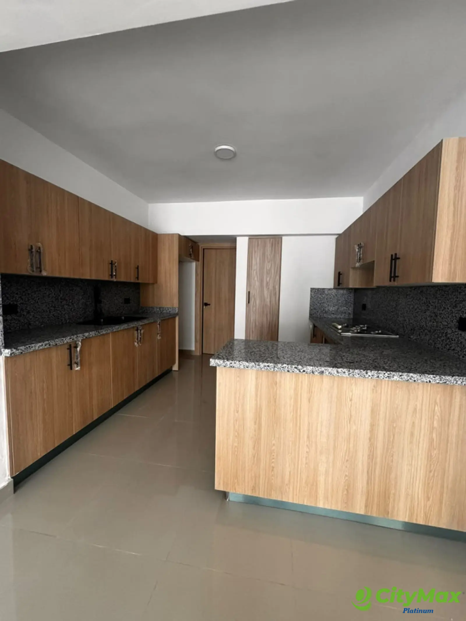 Apartamento en venta en los Restauradores Santo Domingo - Cocina / Desayunador