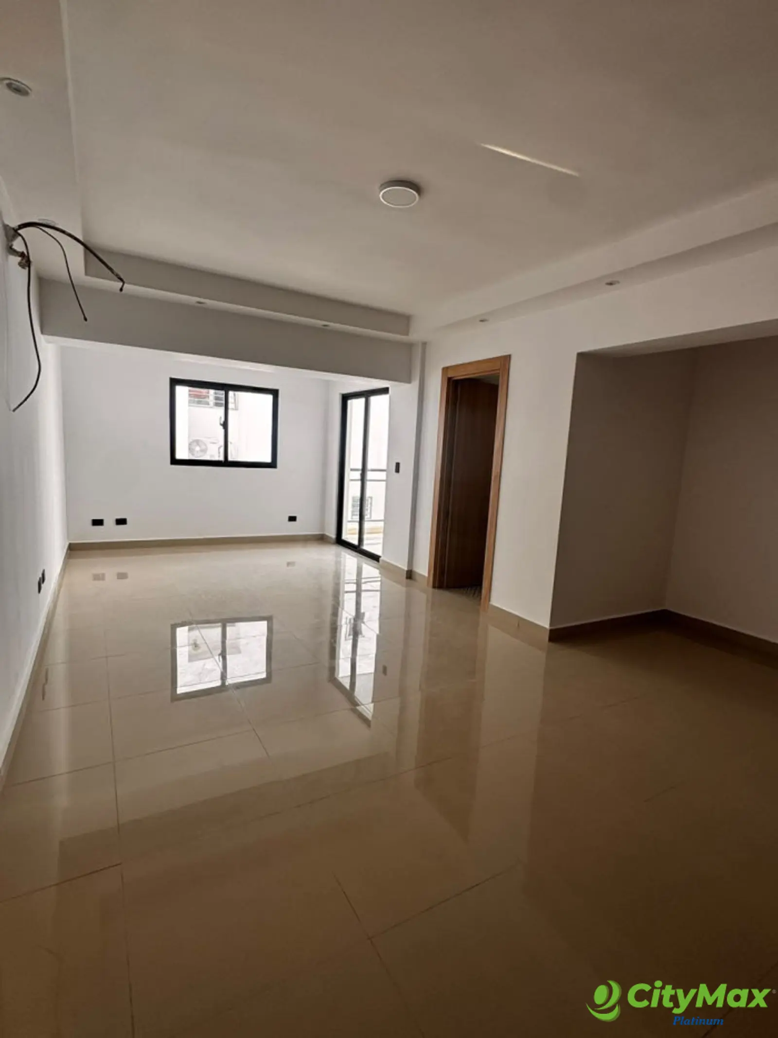 Apartamento en venta en los Restauradores Santo Domingo - Sala / Comedor